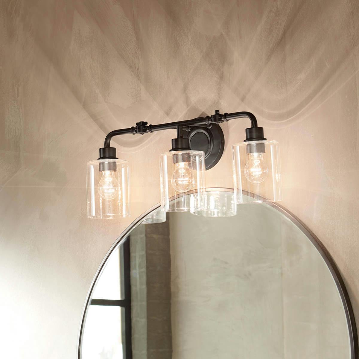 Day time bathroom with Gunnison 3 light vanity light in Black