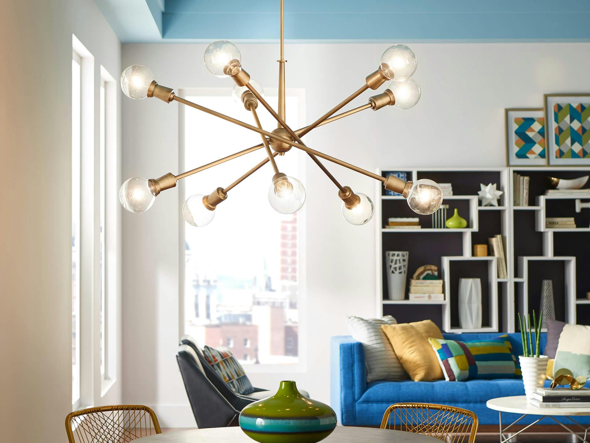 Colorful dining room with an Armstrong chandelier hanging