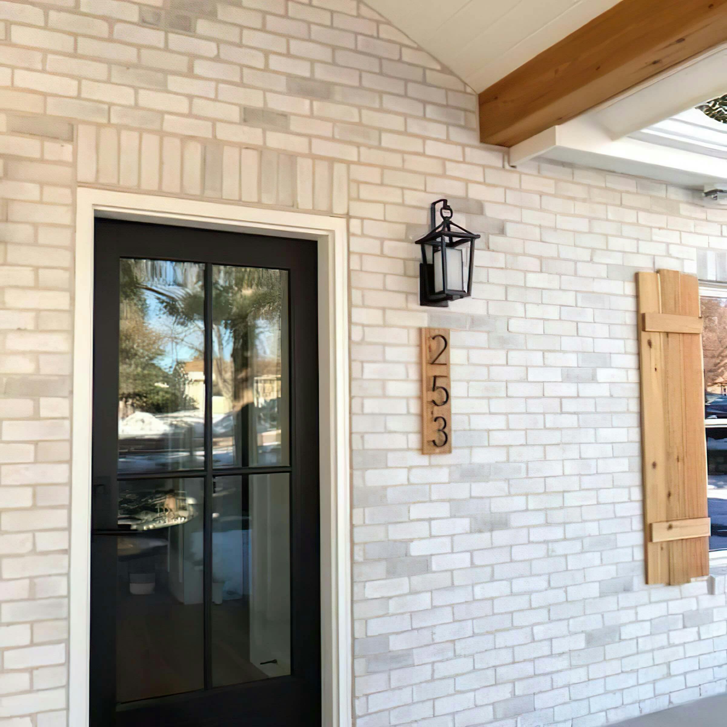 Exterior front entrance to house with Kichler Pendant 