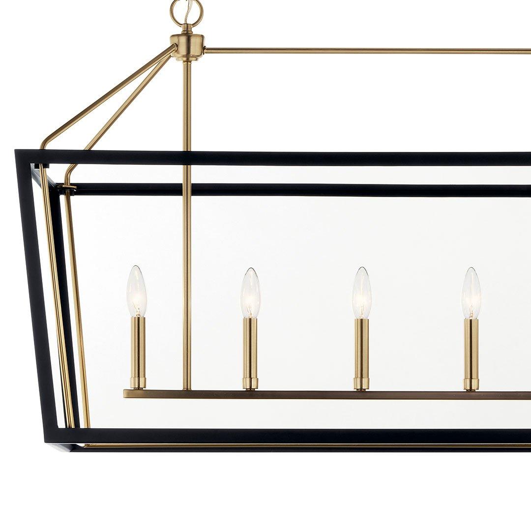 The Delvin 44 Inch 6 Light Linear Chandelier with Clear Glass in Champagne Bronze and Black on a white background