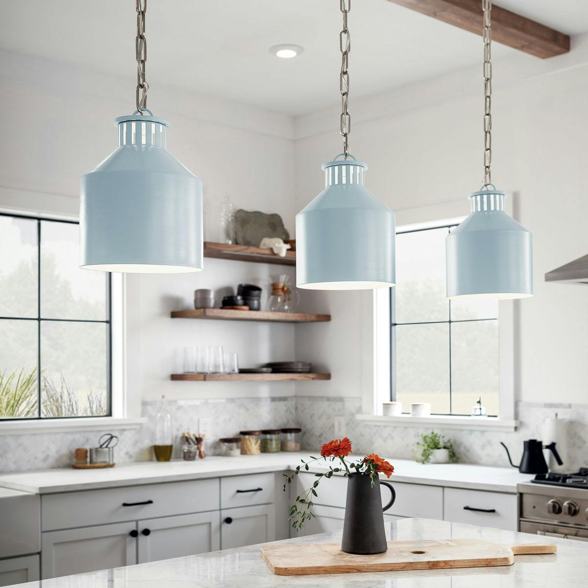 Close up view of the Montauk 1 Light Mini Pendant Light Blue on a white background