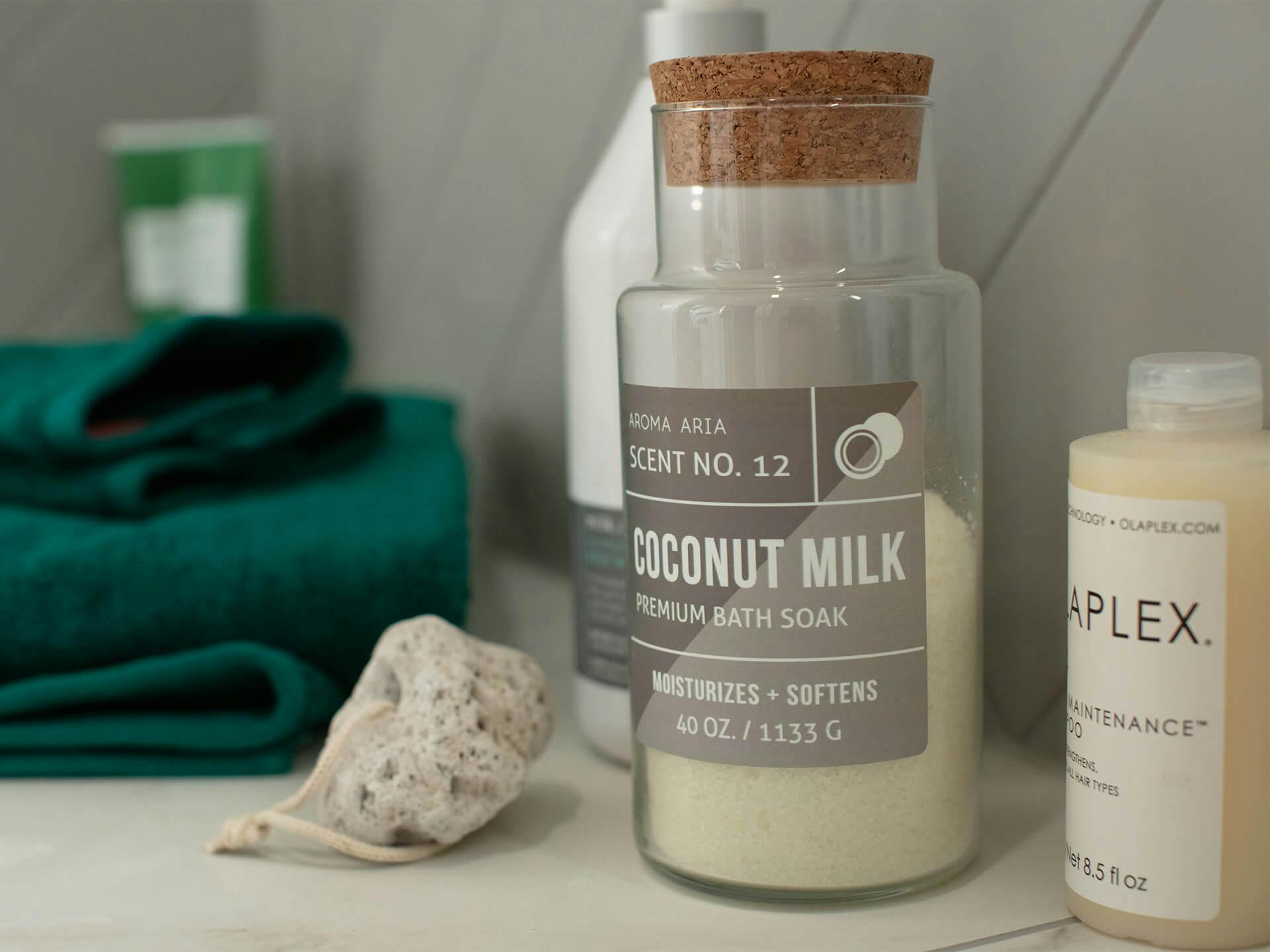 Lifestyle detailed image of personal care products laid out on a bathroom sink table 