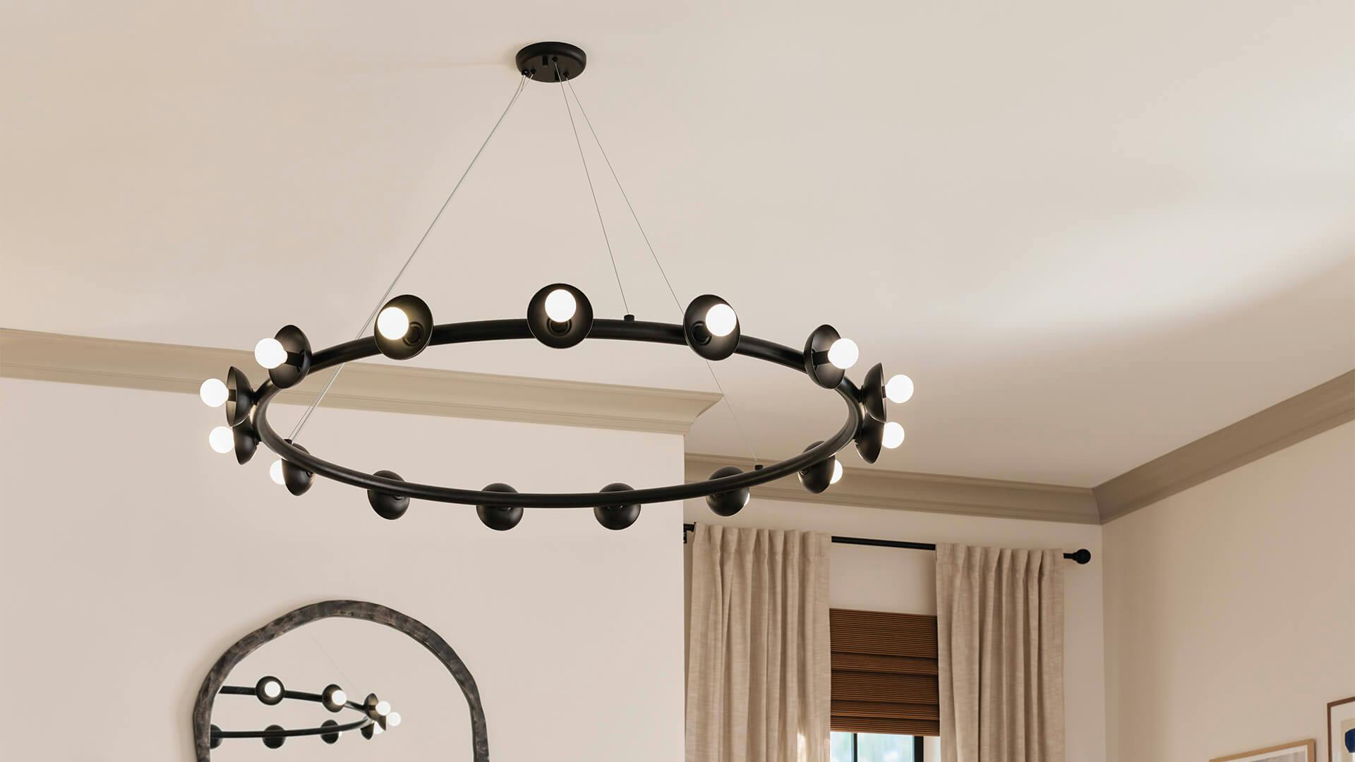 White living room with beige trim and Palta 15-ight chandelier in black finish