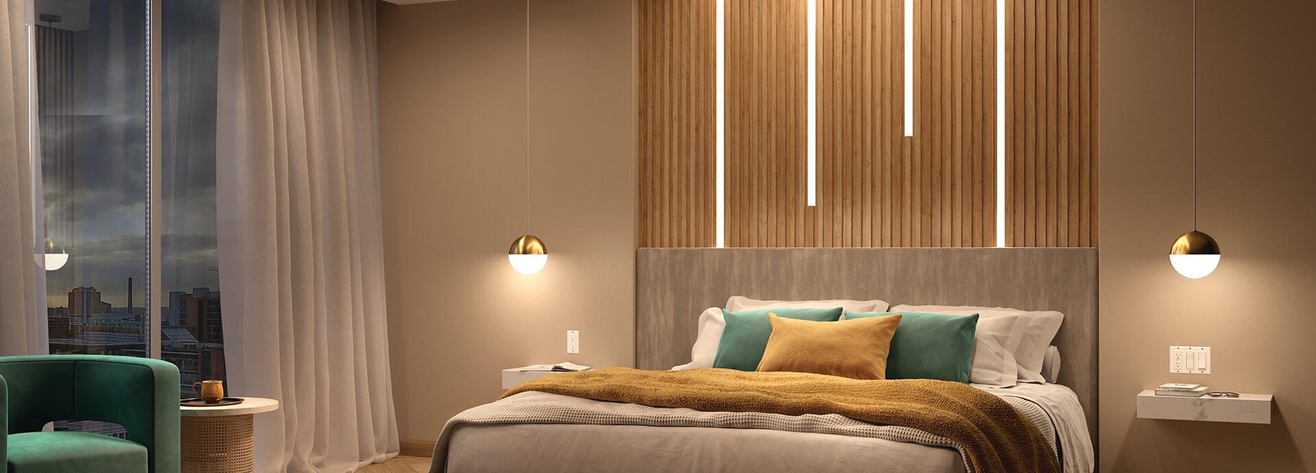 Bedroom with channel lights above the bed and two moonlit pendants in brass on either side of the bed.