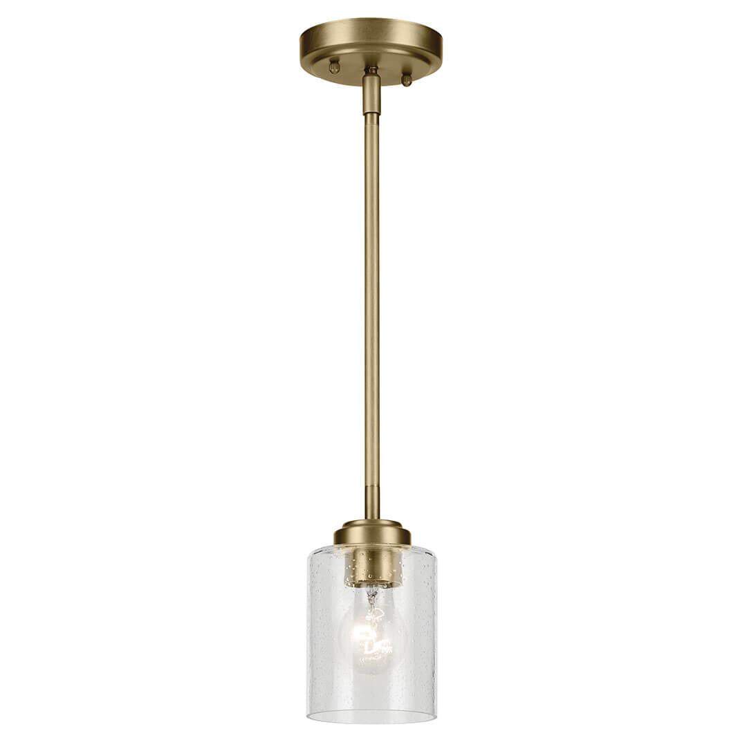 The Winslow 7.5" 1-Light Mini Pendant Light with Clear Seeded Glass in Natural Brass on a white background