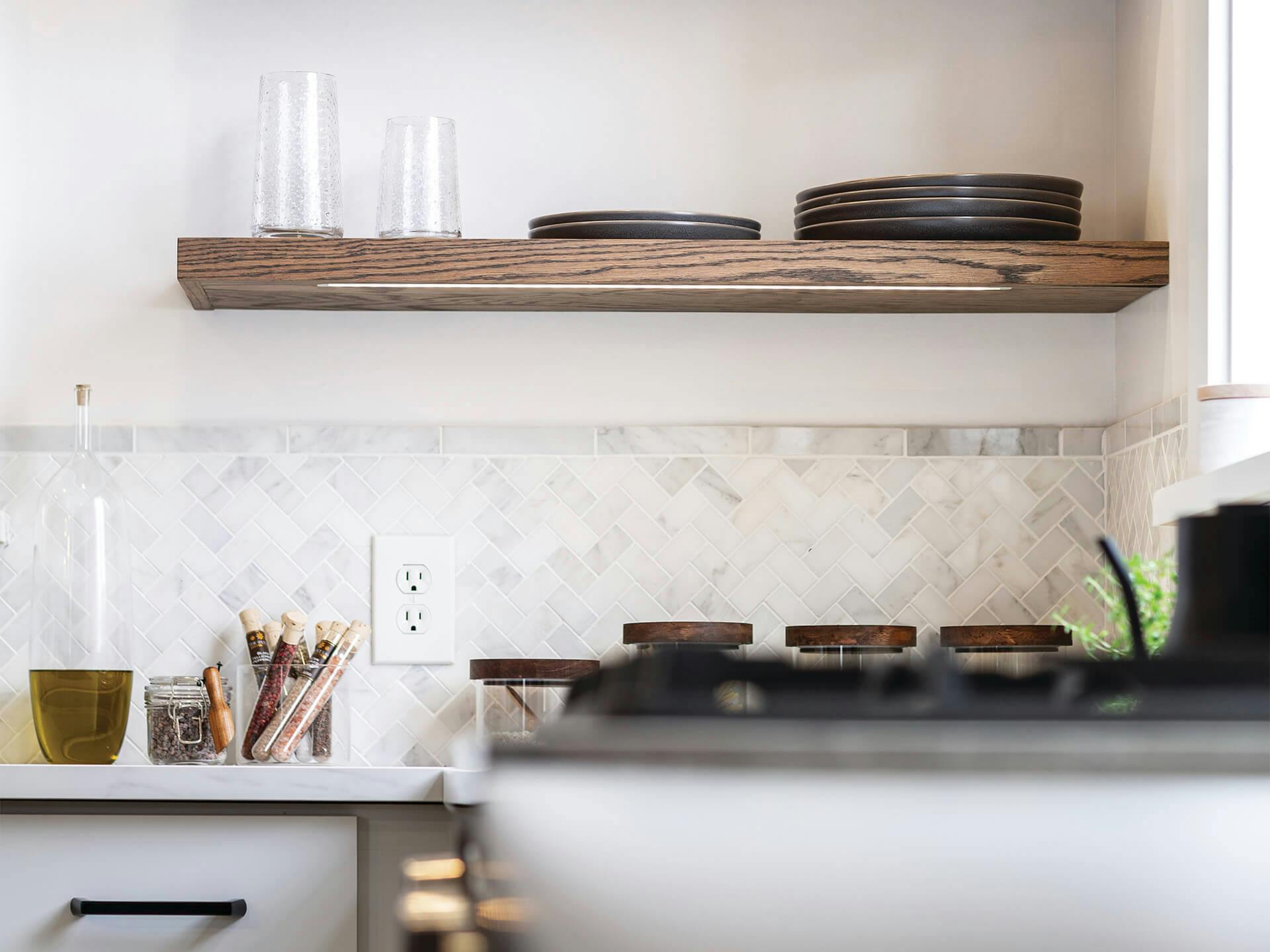 Kitchen shelves with tape lights underneath