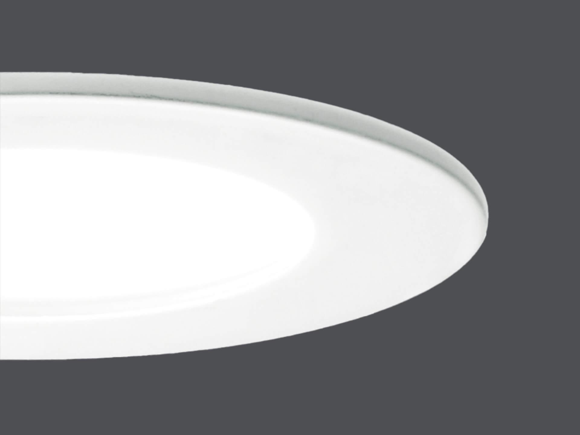 Close up of a slim recessed light.