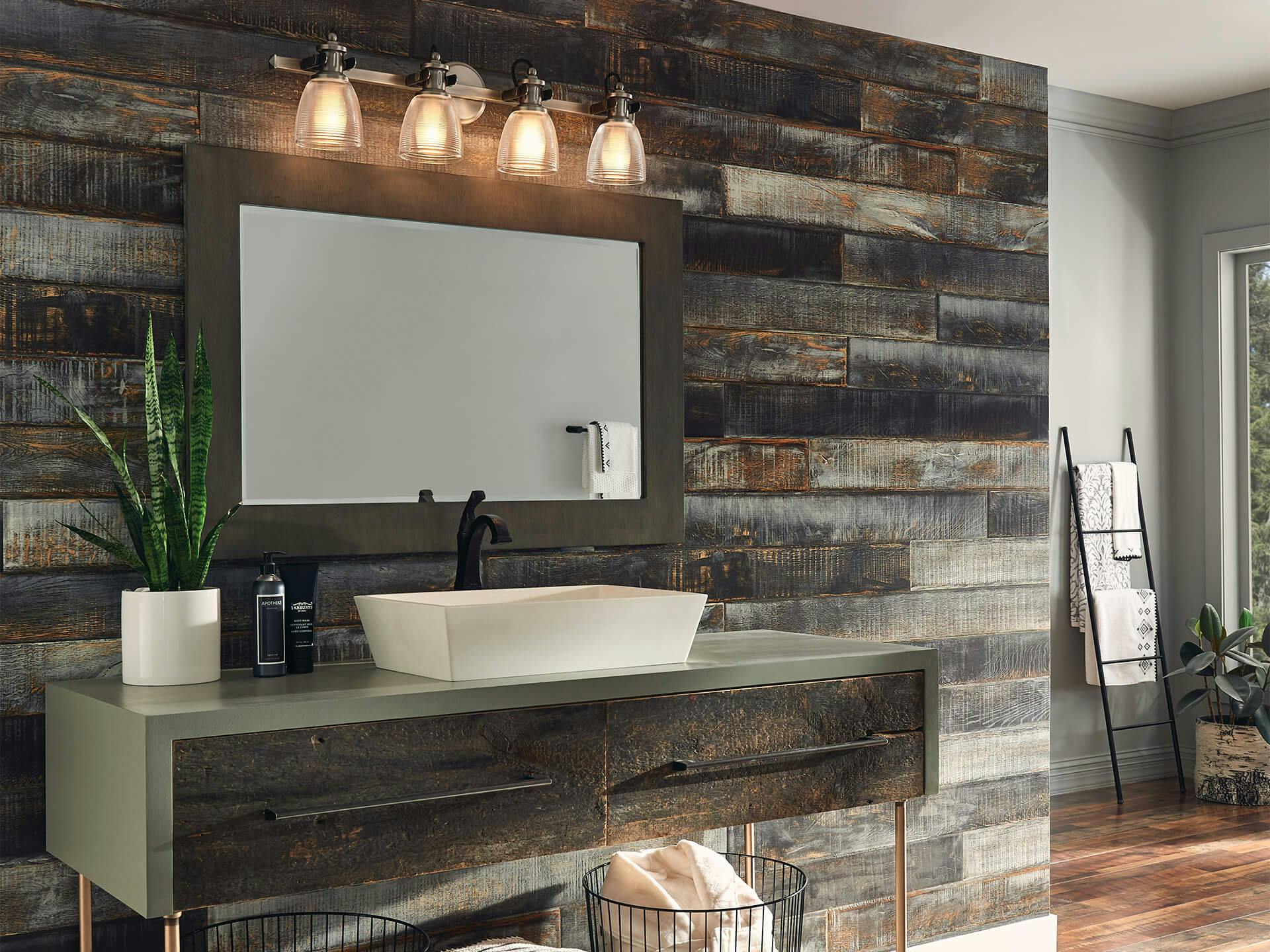 Farmhouse bathroom with Flagship 4 Light vanity mounted on shiplap wall above sink and mirror