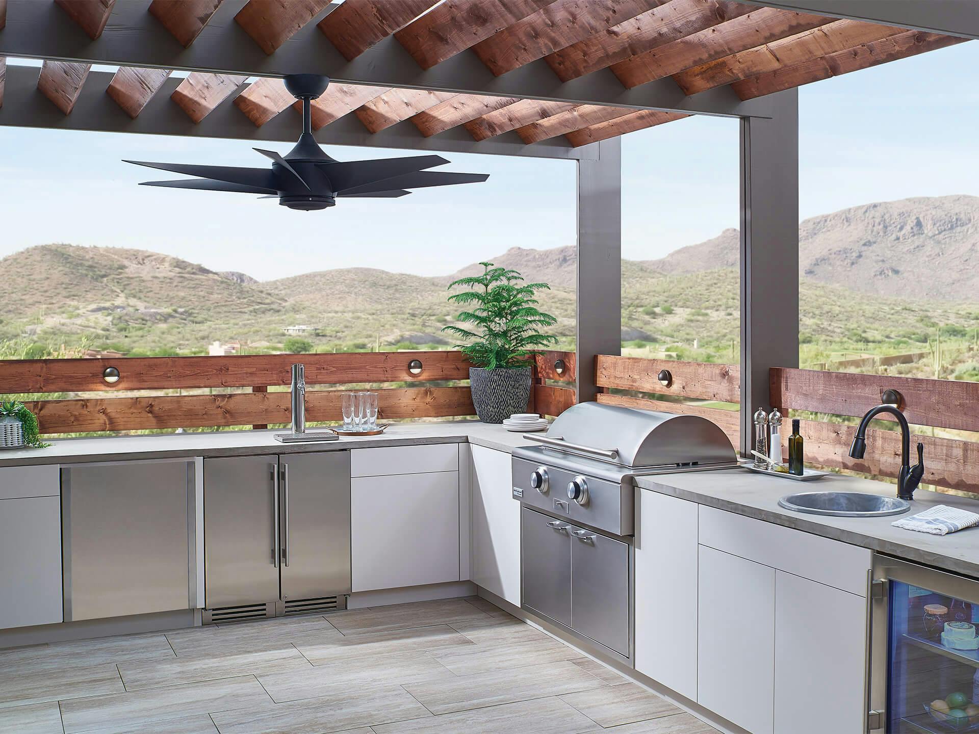 54in Lehr II Fan hanging over outdoor kitchen