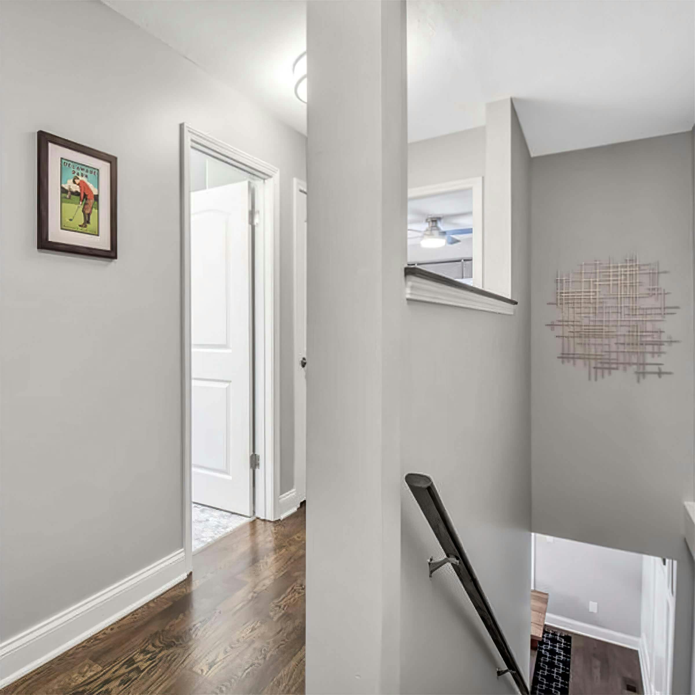 Hallway at the top of stairs in an Airbnb