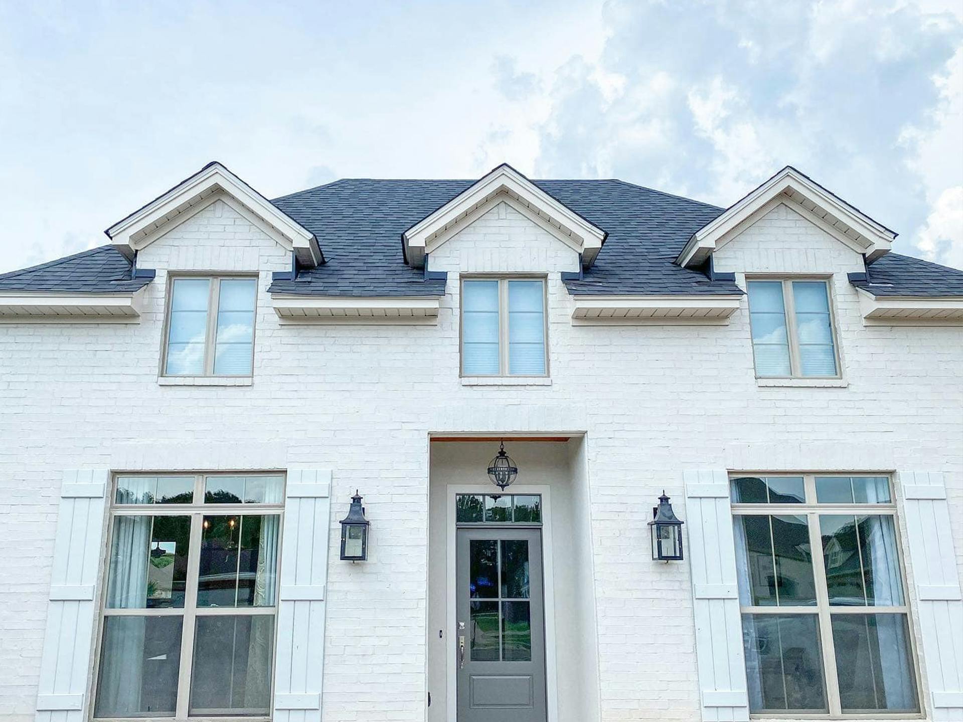 White painted brick exterior of the Monroe, LA St. Jude Dream Home