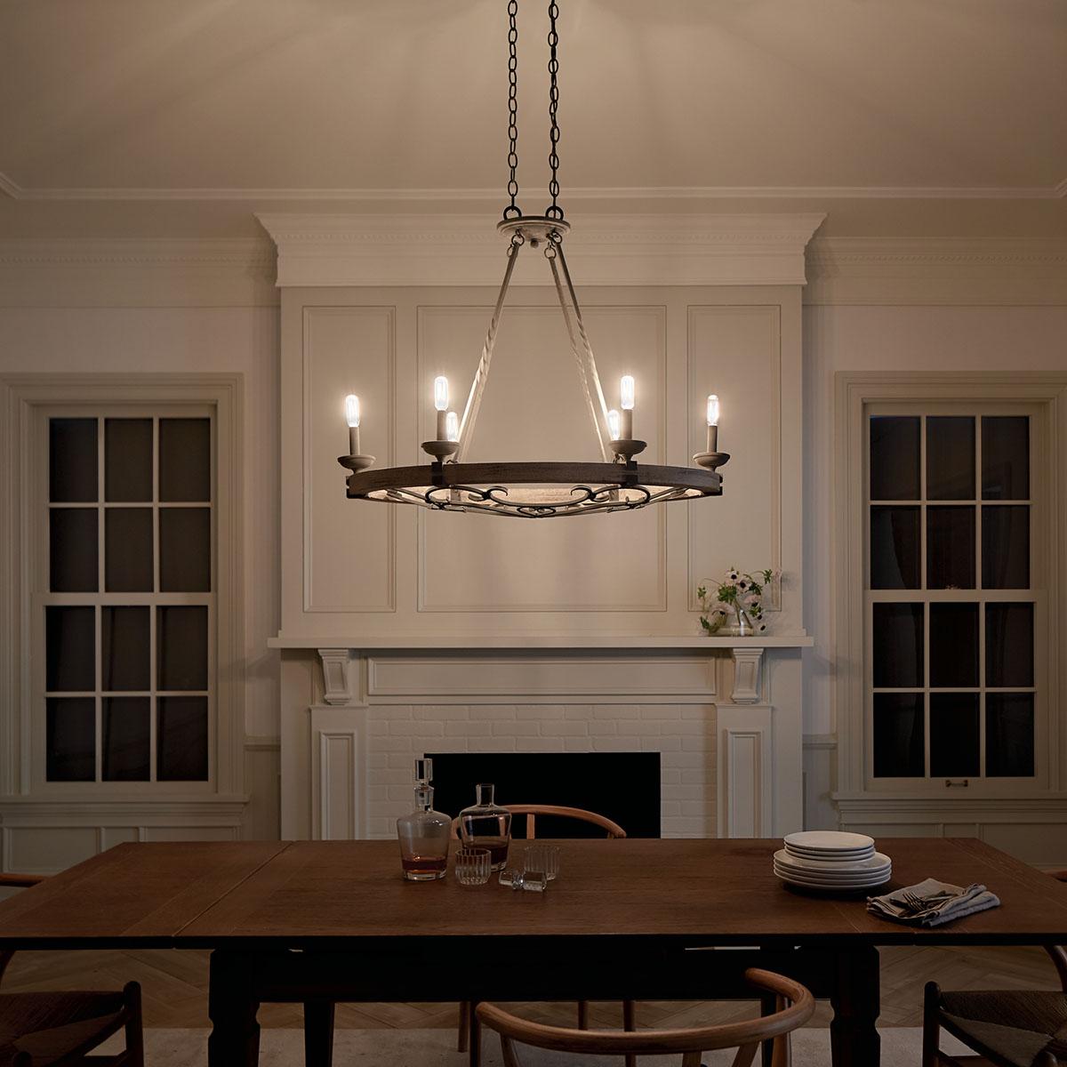 Night time dining room image featuring Taulbee chandelier 43824WZC