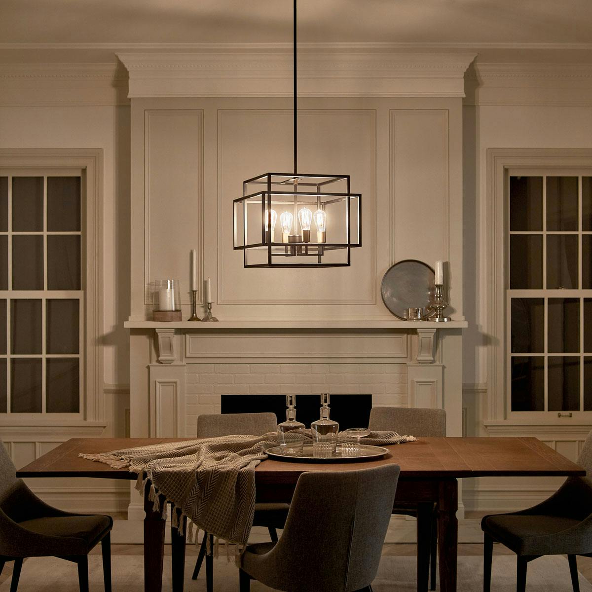 Night time dining room image featuring Taubert pendant 43984BK