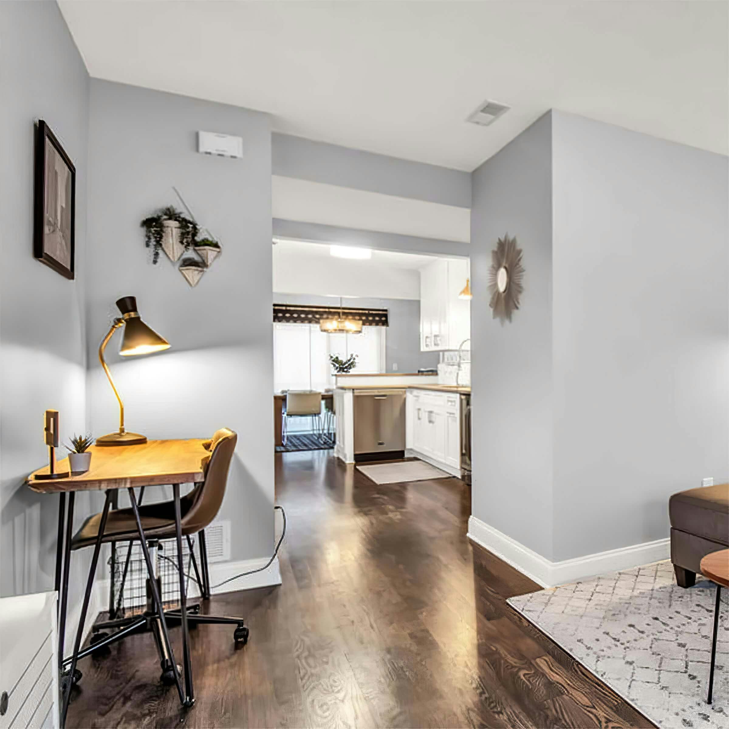 Desk for remote working and hallway to kitchen in an Airbnb