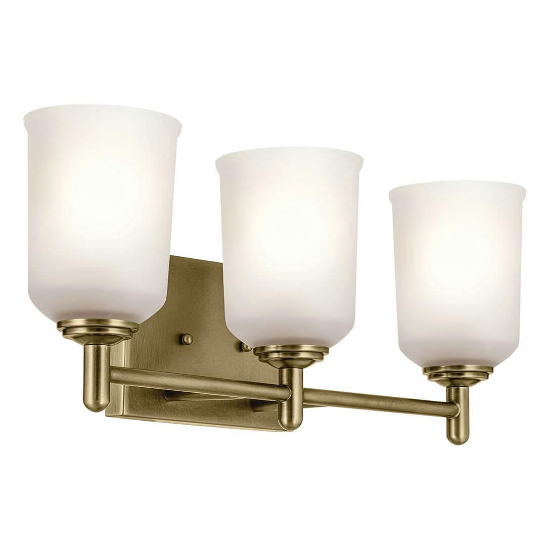 The Shailene 21" 3-Light Vanity Light in Natural Brass on a white background