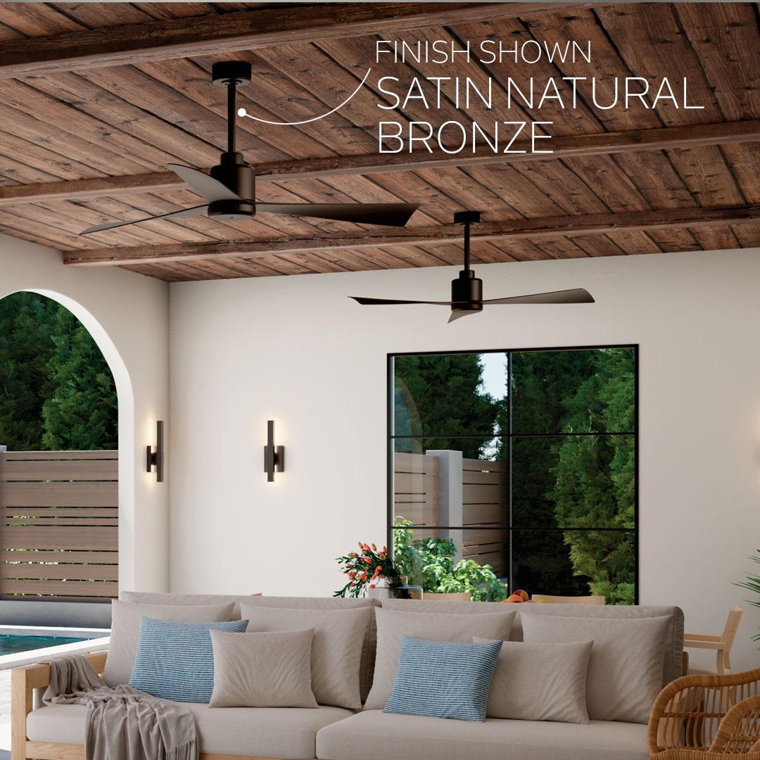 Living room featuring True ceiling fans in satin natural bronze