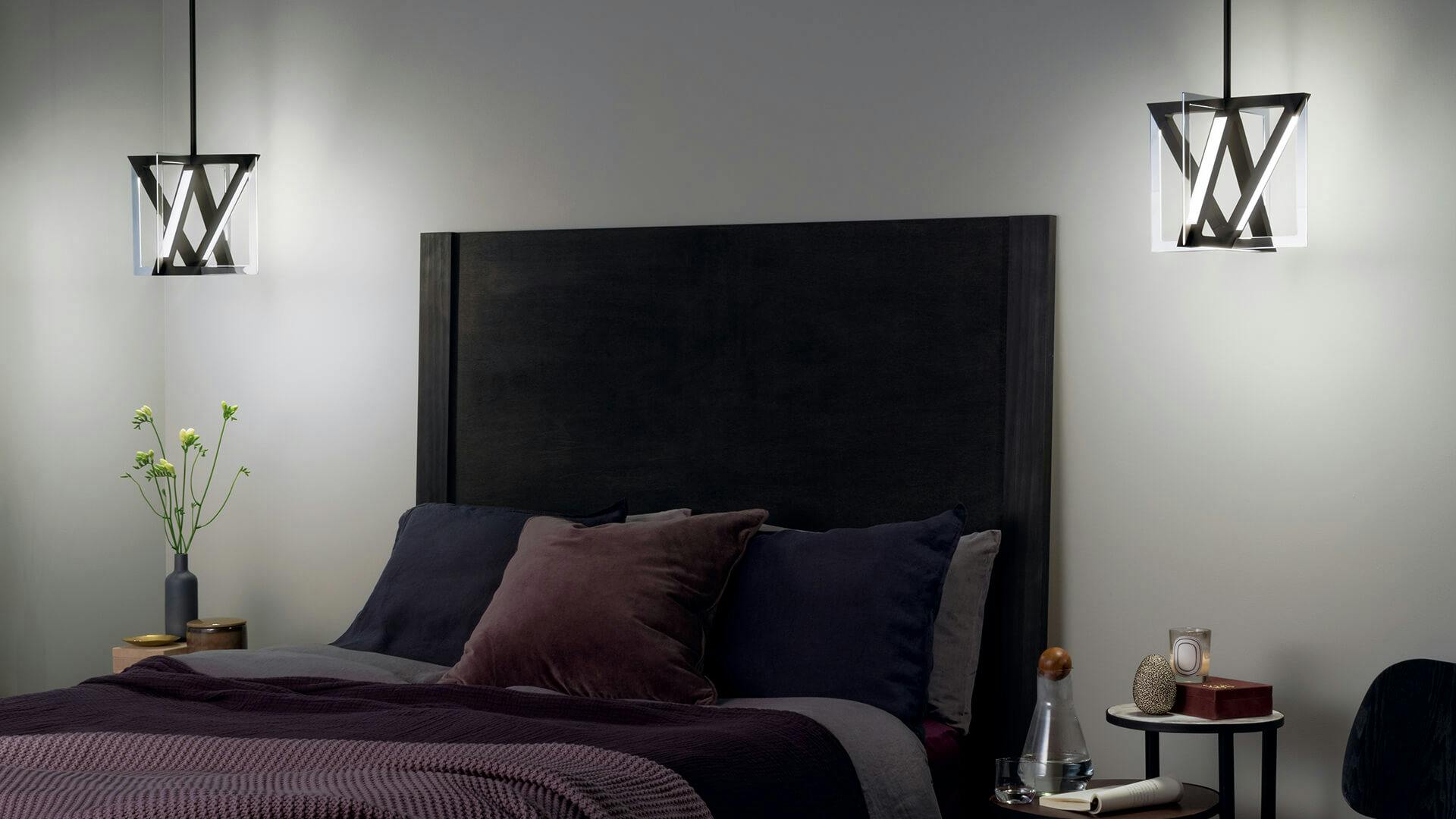 Head of a bed with two Axis pendants on each end hanging above side tables