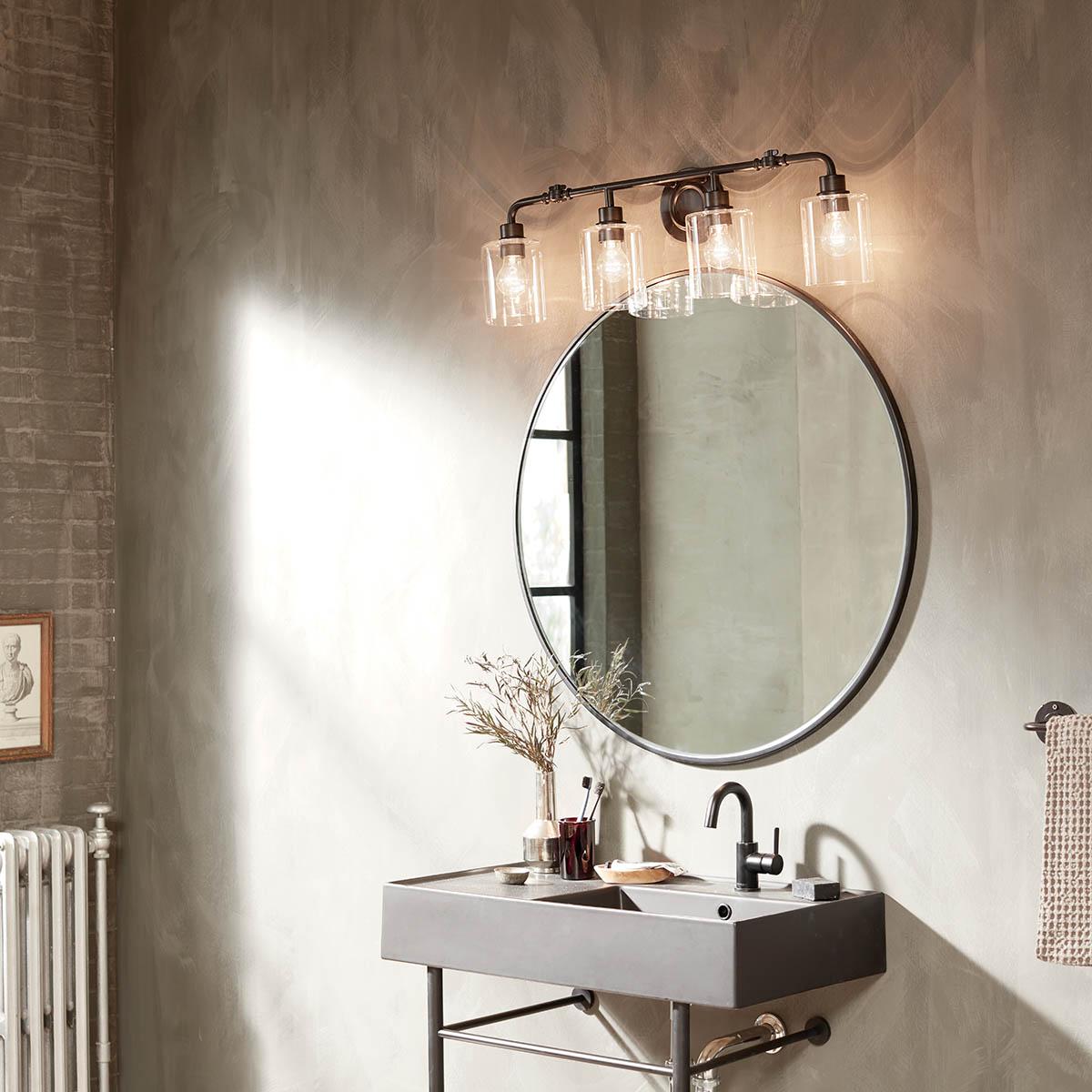 Day time bathroom with Gunnison 4 light vanity light in black